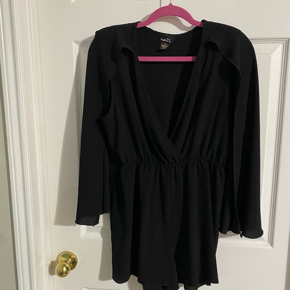 Brand new without tags Rue21 Black Romper with attached cape
